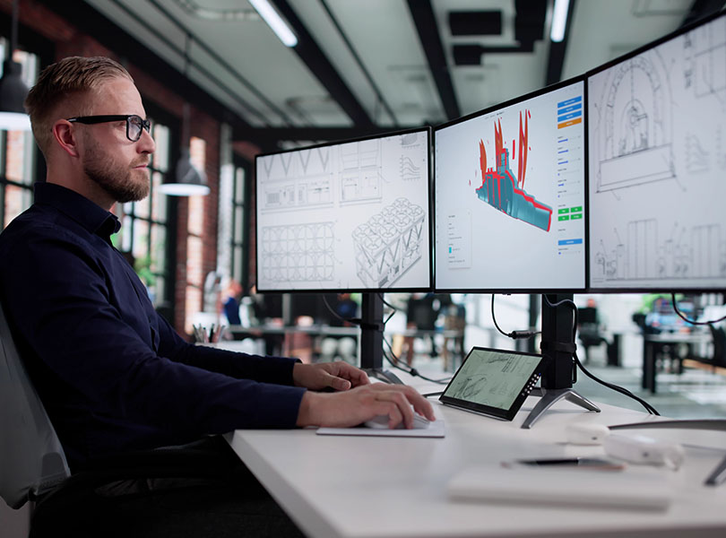 Young,Caucasian,Man,Using,Computer,To,Design,Mechanical,Product,In Design for Manufacturability